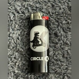 NWT Circle K Dino riding a moto-scooter themed lighter